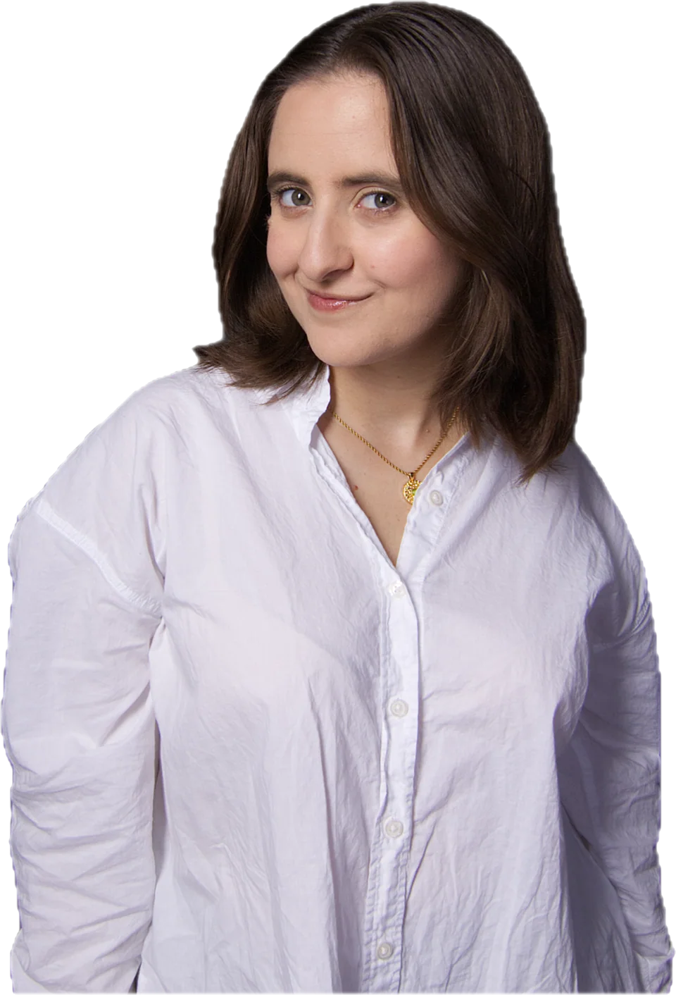 Camila in a white button-up shirt and a thin gold necklace, head tilted, half-smiling.